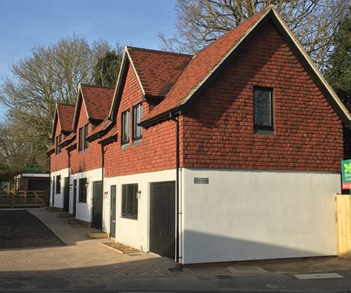 Three one-bedroom starter homes built on an exceptional tight site in Surrey on behalf of a development company